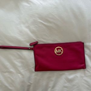 Pink MK clutch (see third photo for wear on logo)
